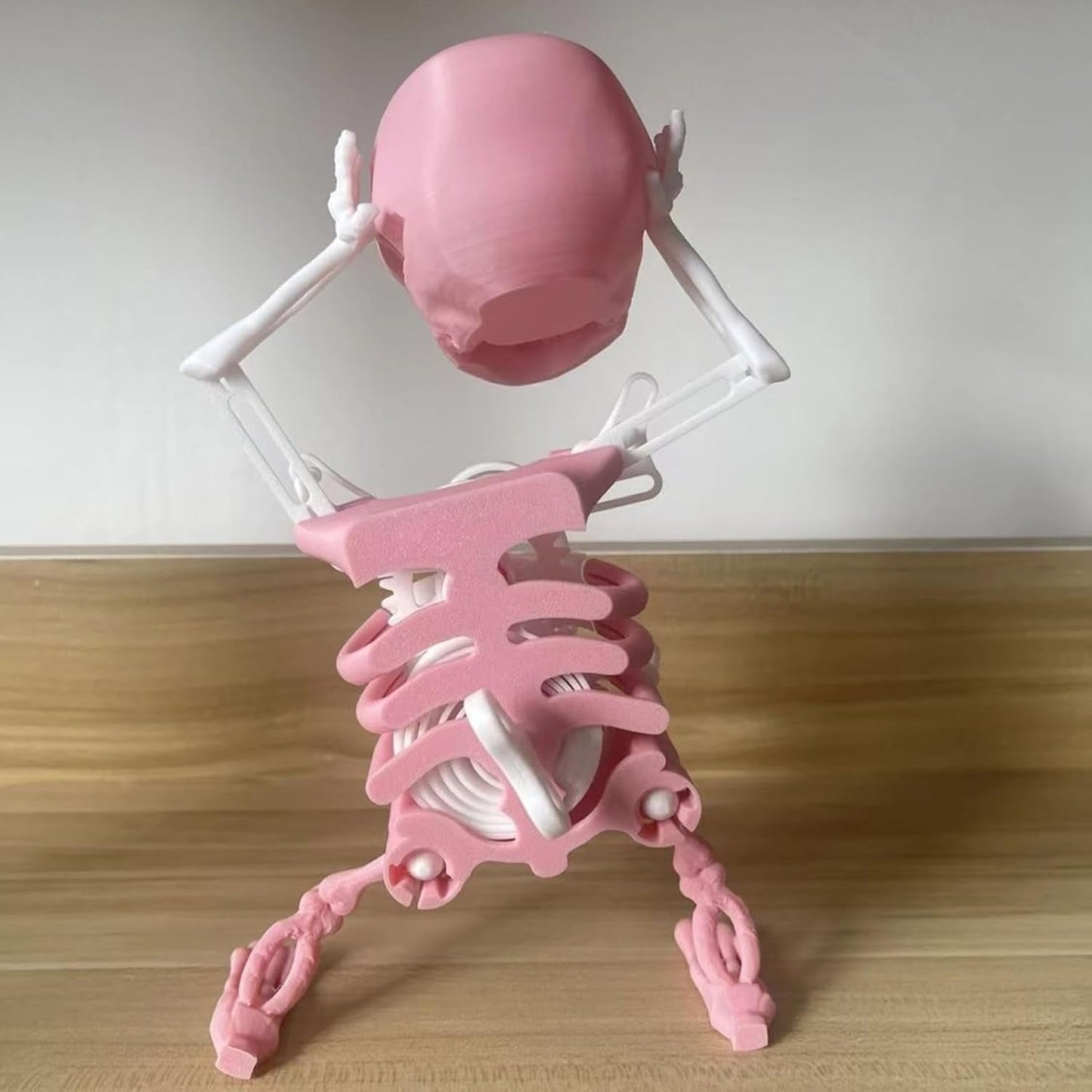 Dancing and Swinging Skull Toy